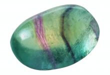 green Fluorite (fluorspar) gemstone isolated
